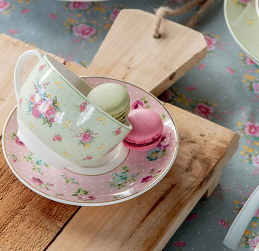 Cup with macaron.