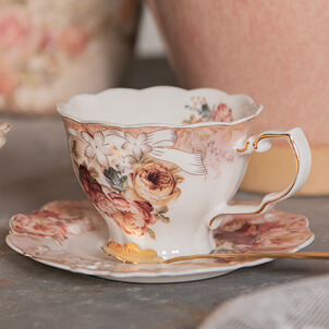Cup with saucer.