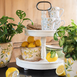 Etagere with cups and lemons.