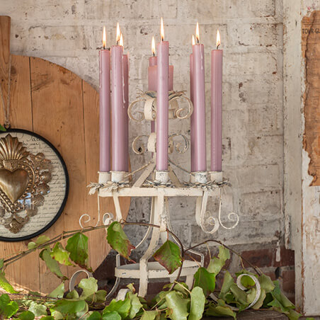 White candleholder with 8 candles.