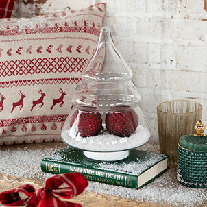 Christmas balls in a glass Christmas tree.