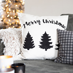 Christmas pillow with "Merry Christmas" on it.