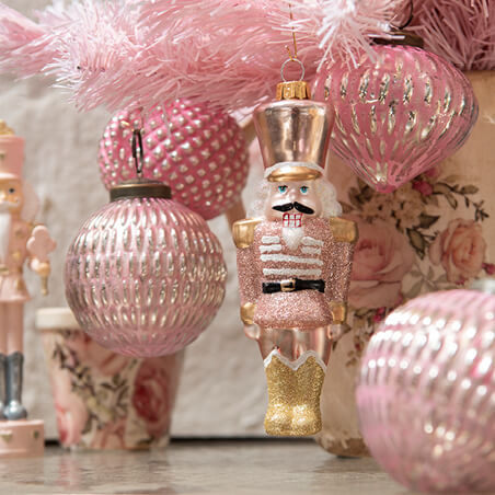 Pink Nutcracker in a pink Christmas tree.