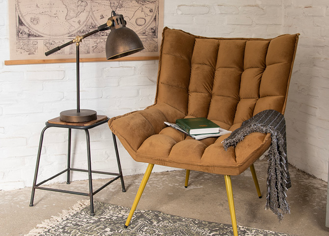 Brown Armchair with an Industrial Table Lamp