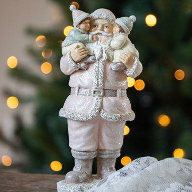 A pink Santa Claus carrying two children