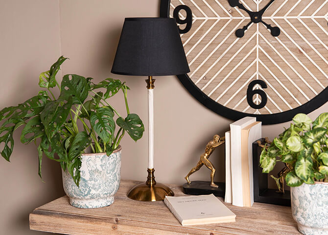 Modern and sleek table lamps add ambiance to a modern interior.
Sleek and static mood lighting, such as table lamps, are beautiful items for a modern interior