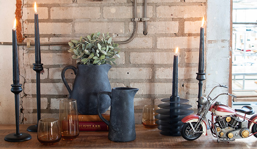 Two anthracite pouring jugs with black candle holders and a metal motor